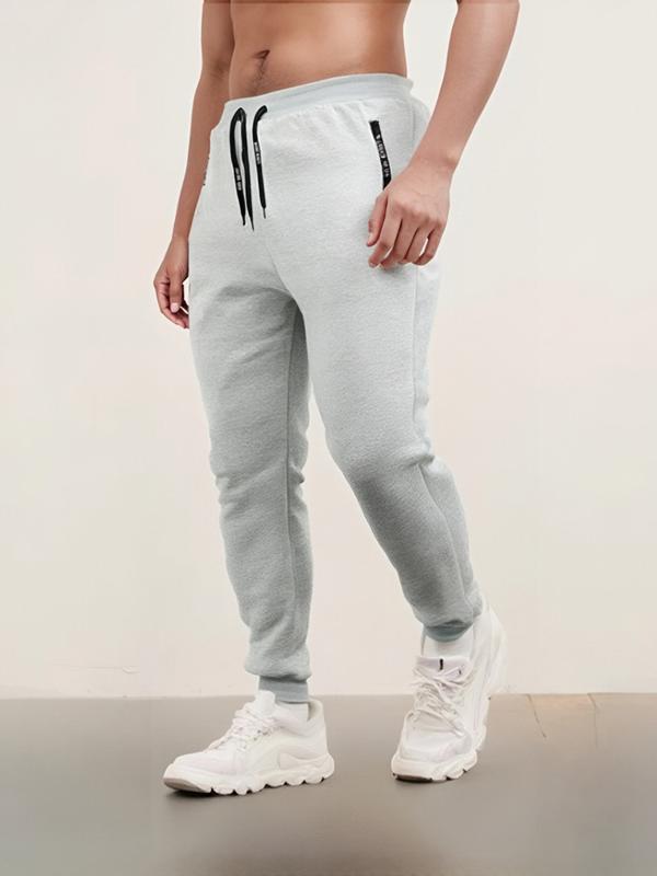 Men's 3-pack sports sweatpants, featuring exquisite embroidered zipper pockets and embroidered drawstrings.